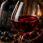 Glass of Egri Bikavér red wine with Várvédő 2021 bottle
